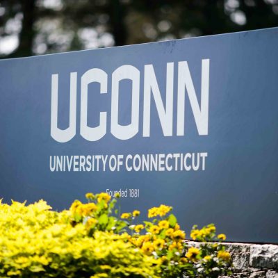 Blue "University of Connecticut" sign with white letters